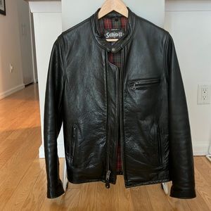 Men’s motorcycle jacket.  Leather size small.